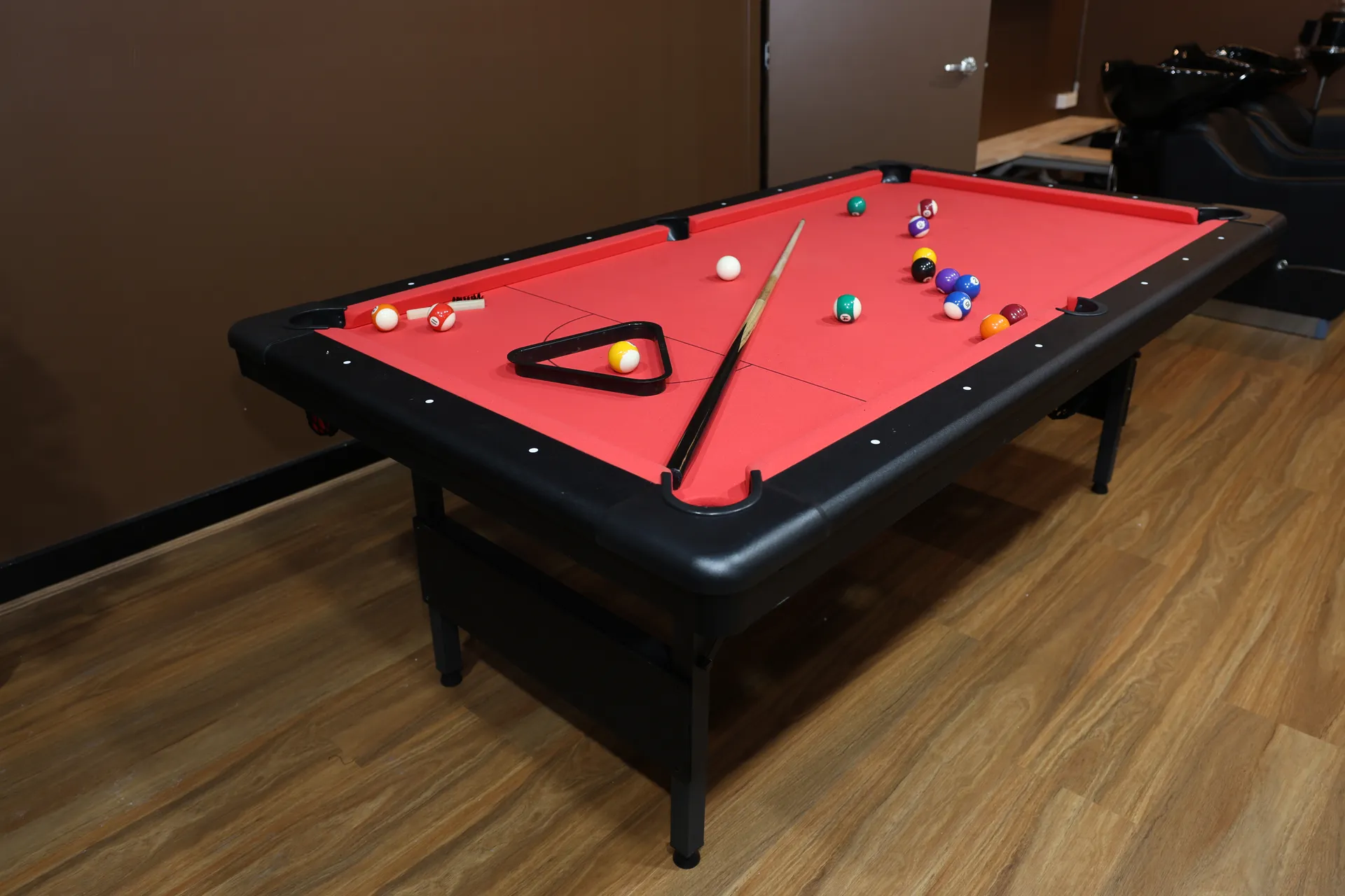 The pool table in the salon's recreation corner